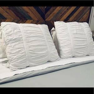 Ruched white Pottery Barn euro shams